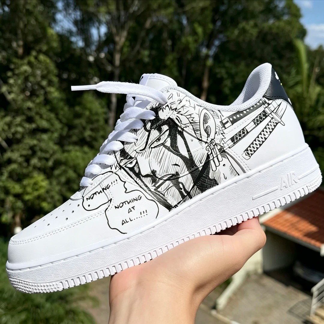 Side view of hand-painted manga artwork on white sneakers
