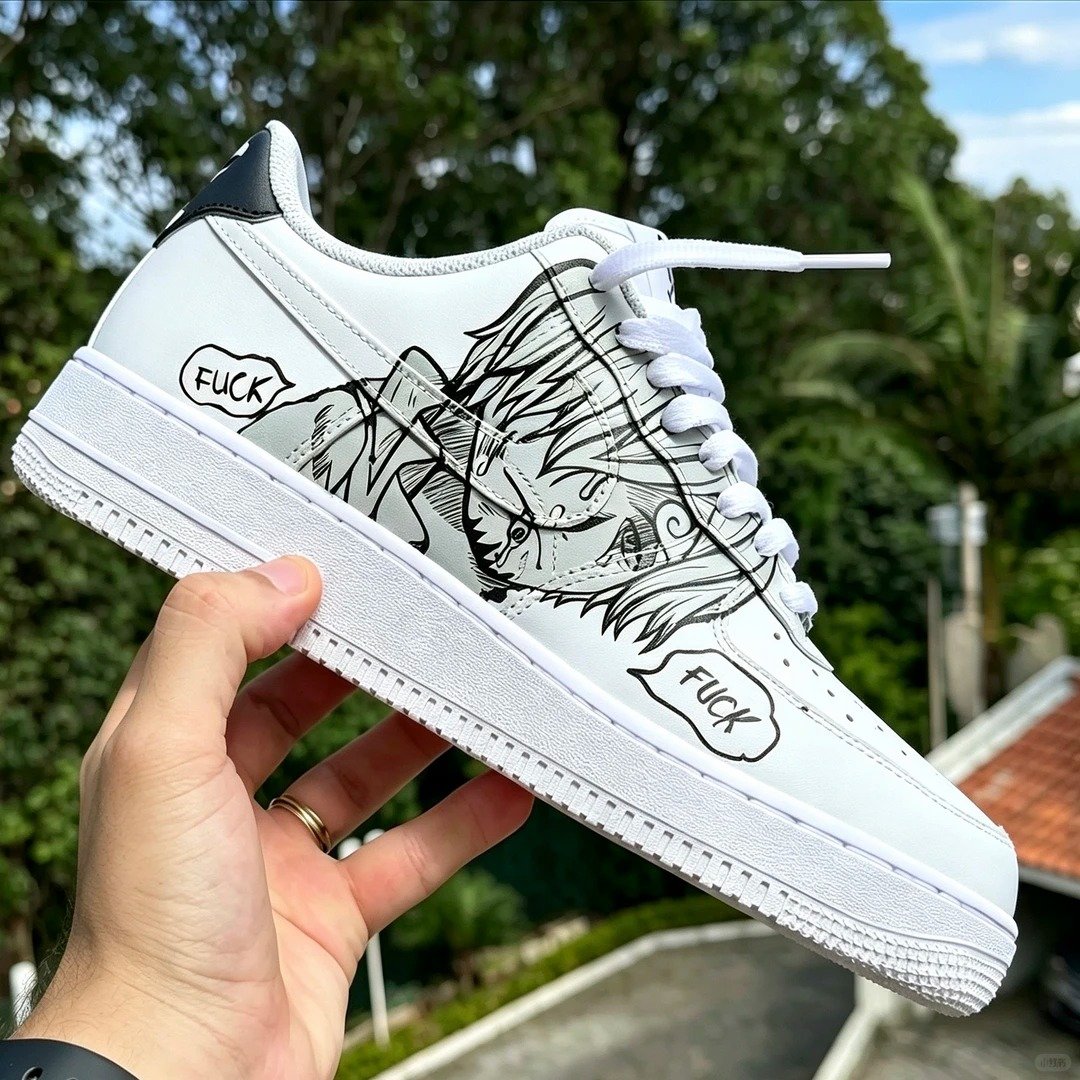 Close-up of hand-painted comic speech bubbles on white sneakers