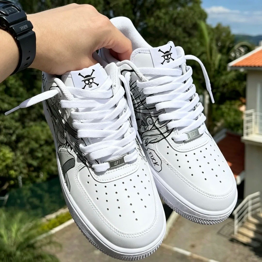 Pair of hand-painted manga sneakers held side by side